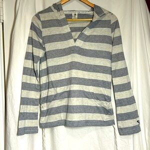 Roxy long sleeve hooded shirt with front pocket and side cinches